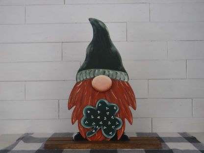 Painted version of a wooden cutout gnome that we call Belvin