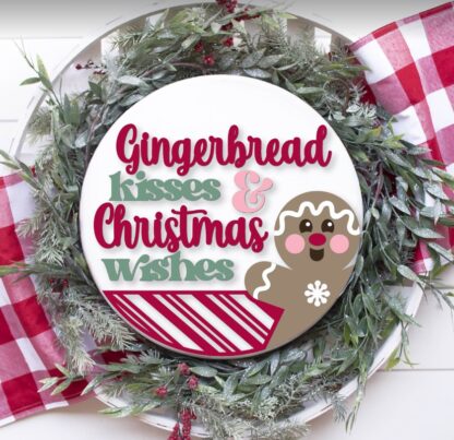 Painted version of wooden sign kit saying Gingerbread Kisses