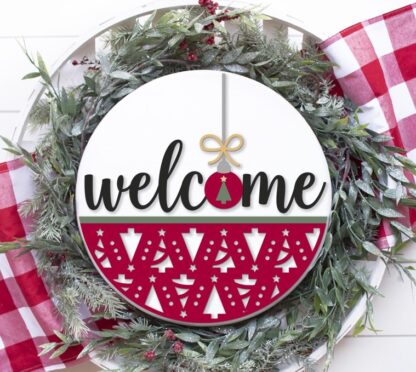 Painted version of wooden sign kit saying Welcome with Christmas Trees.