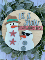 Painted version of wooden sign kit saying Let it snow somewhere else.