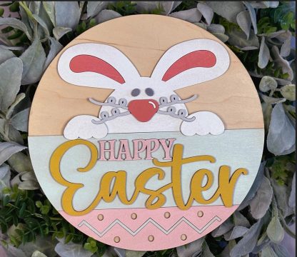 Painted version of wooden sign kit saying Happy Easter.