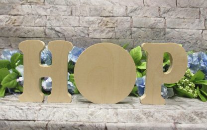 Free standing letters that spell HOP with the O filled in.
