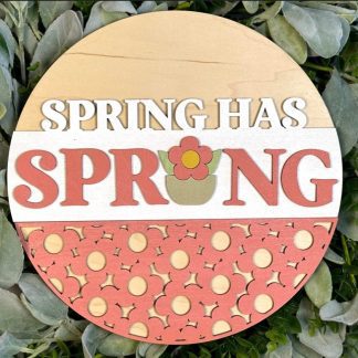 Unfinished version of wooden sign kit saying Spring has Sprung.